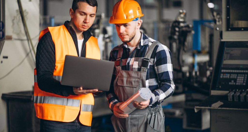 Two colleagues at a factory