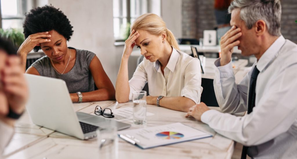 Worried business people working in the office