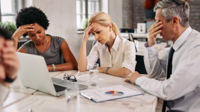 Worried business people working in the office