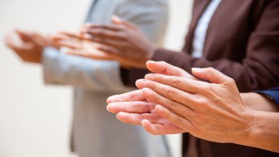 Hands of business people applauding speaker